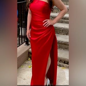 Once worn prom dress. Slit on side, strapless, Good condition.